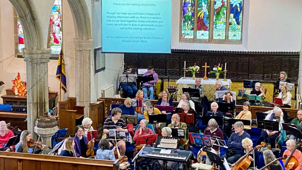 The Bondleigh Barn Band in an church concert